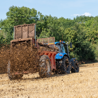 Image of Muck spreading farm tractor