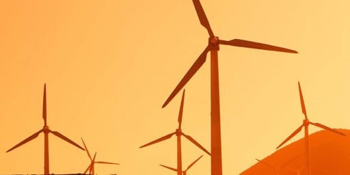 Image of Wind Turbines with sunset